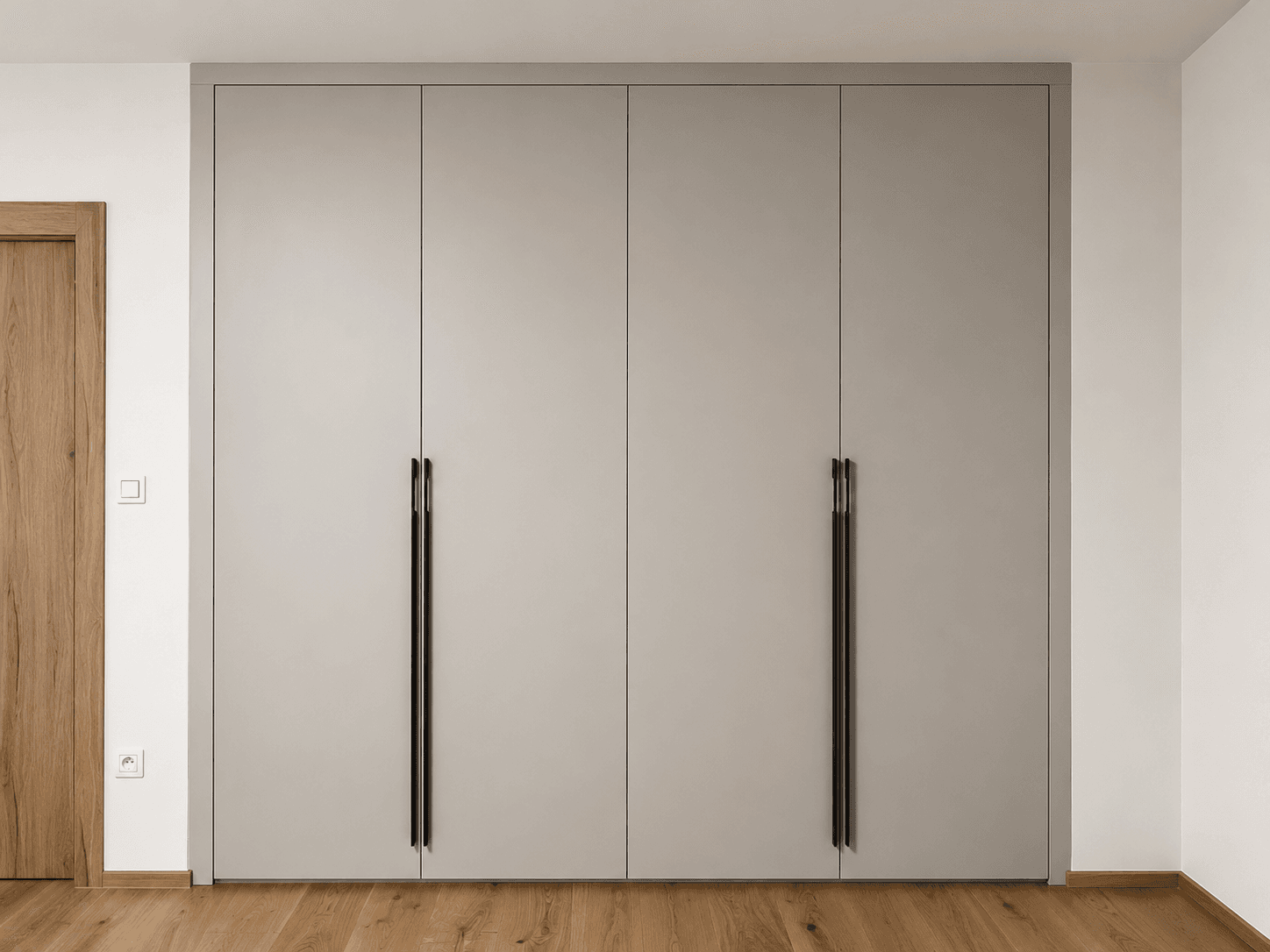 Custom built-in wardrobe with black handles